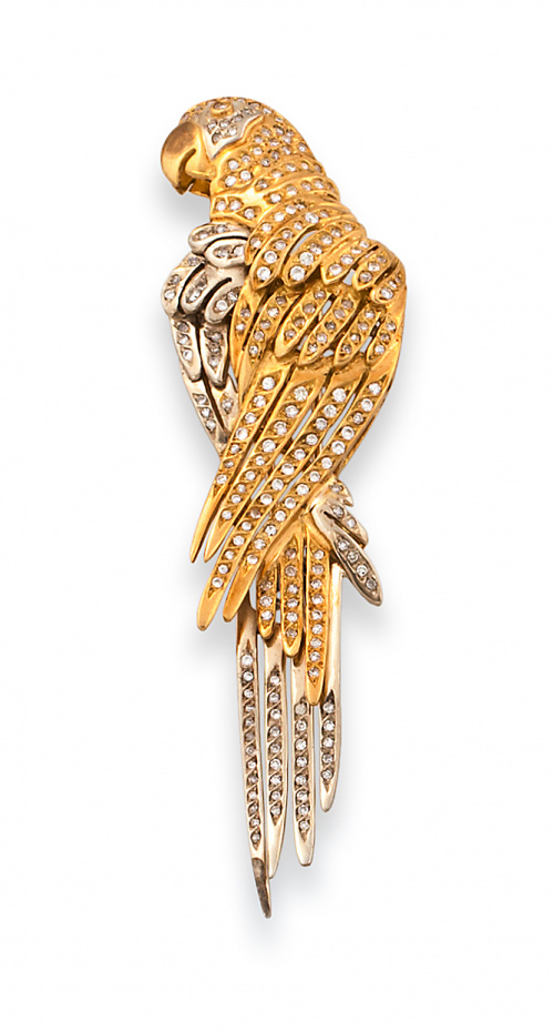 Broche de brillantes en forma de ave exótica en oro bicolor