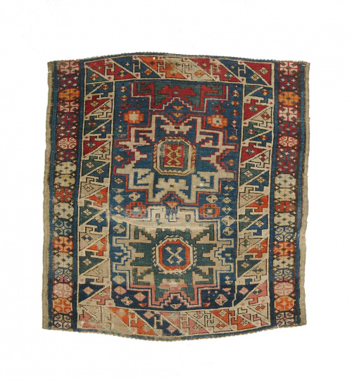 Alfombra antigua en lana con motivos geométricos, Cáucaso.