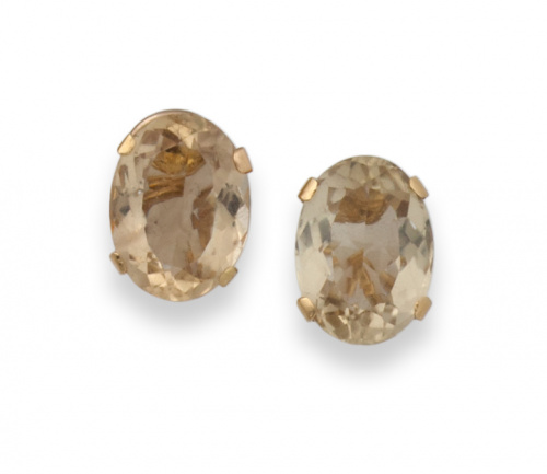 Pendientes con cuarzo citrino ovalados en oro de 18K.