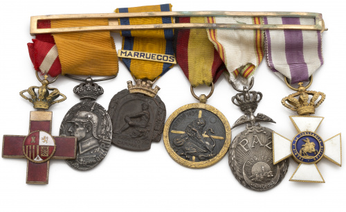 Conjunto de seis medallas unidas en pasador. Distintos meta