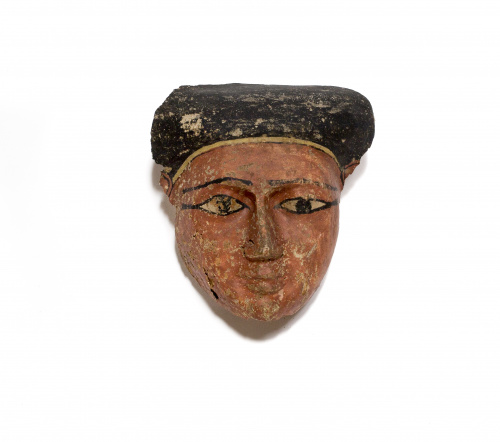 Máscara de sarcófago egipcia realizada en madera, recubiert
