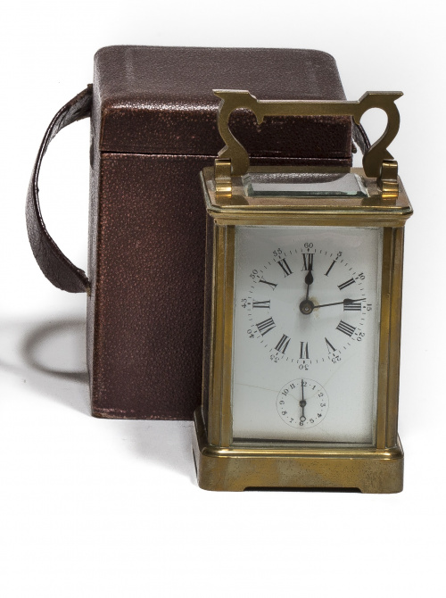 Reloj despertador de carruaje en bronce.Suiza, S. XIX.