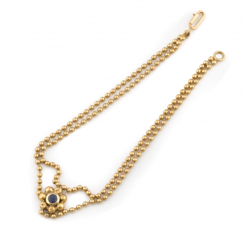 Pulsera de dos hilos, bolitas de oro con flor central adorn