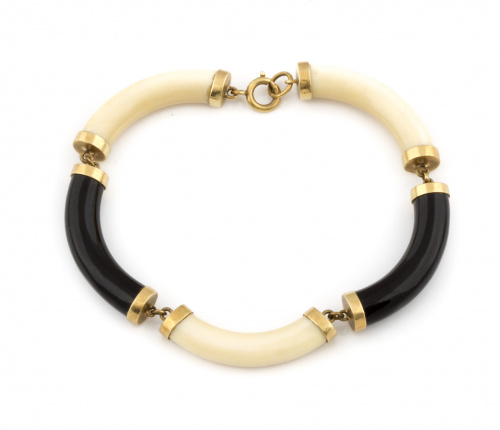 Pulsera de piezas de ónix y marfil en forma de cilindros ar