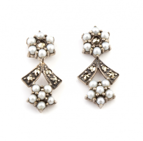 Lote de siete parejas de pendientes en plata con diferentes