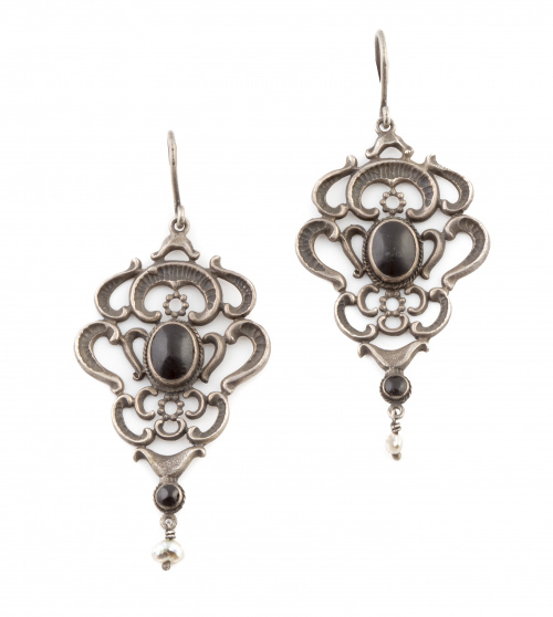 Lote de siete parejas de pendientes en plata con diferentes