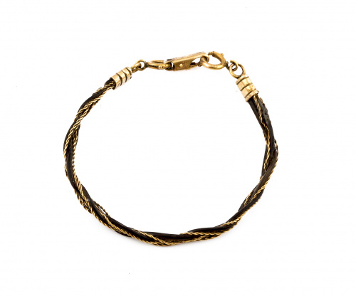 Pulsera trenzada de pelo de elefante y cordoncillo de oro a