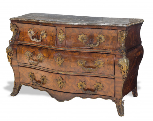 Cómoda “tombeau” en el gusto regencia en madera de palo de 