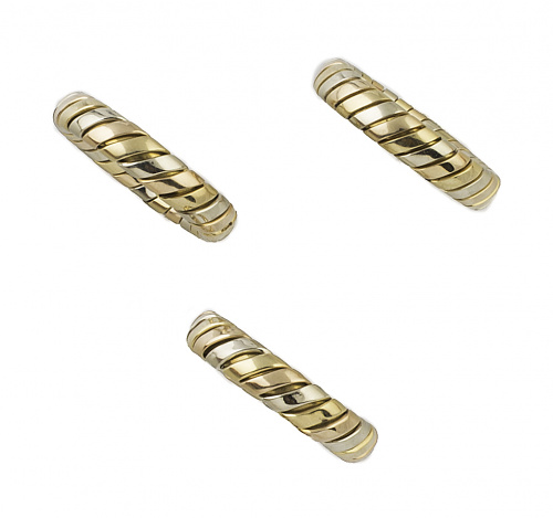 Lote formado por tres anillo BVLGARY en oro tricolor de 18K