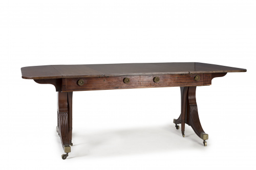 Mesa de biblioteca Regencia extensible en madera de caoba. 