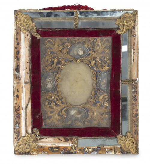 “Agnus Dei”, papel dorado  y reliquias sobre minerales.Tra