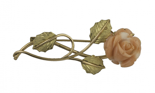 Broche flor con rosa de coral en oro amarillo de 18K