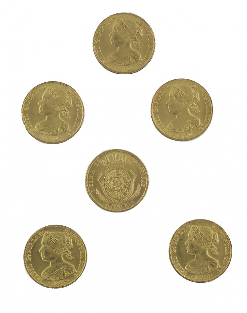 Seis monedas de 100 reales de Isabel II de 1862.  Probablem