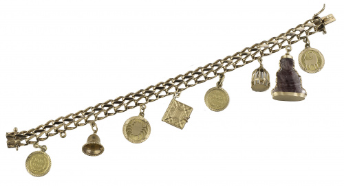 Brazalete articulado de los años 50 con varios charms colga