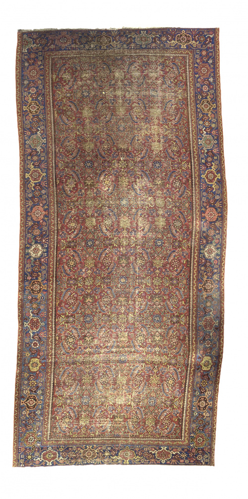 Alfombra antigua en lana con motivos geométricos y vegetale