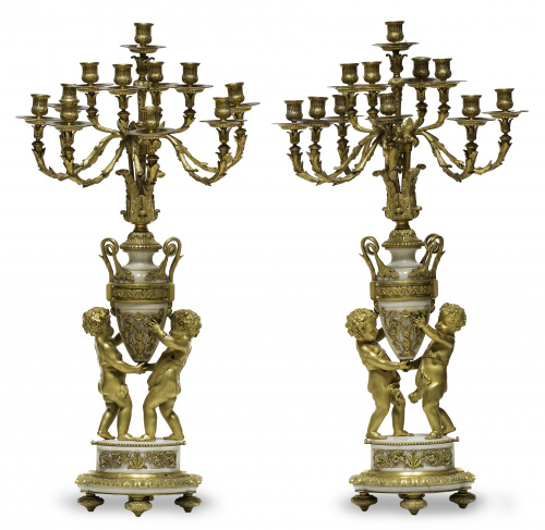 Graux-Marly*. Pareja de candelabros en bronce dorado sobre