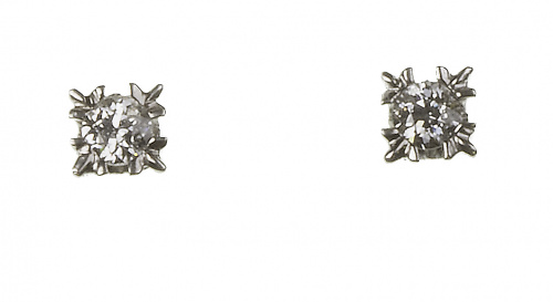 Pendientes dormilonas de brillante en garras en forma de es