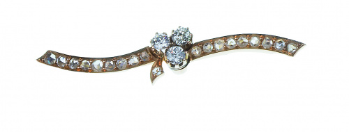 Broche de pp. S. XX con trébol de brillantes sobre línea si