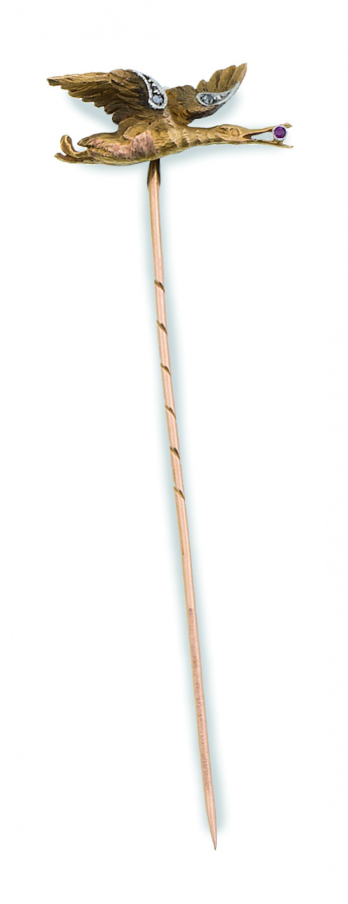 Broche alfiler de pp. S. XX con cigüeña que sujeta un rubí 