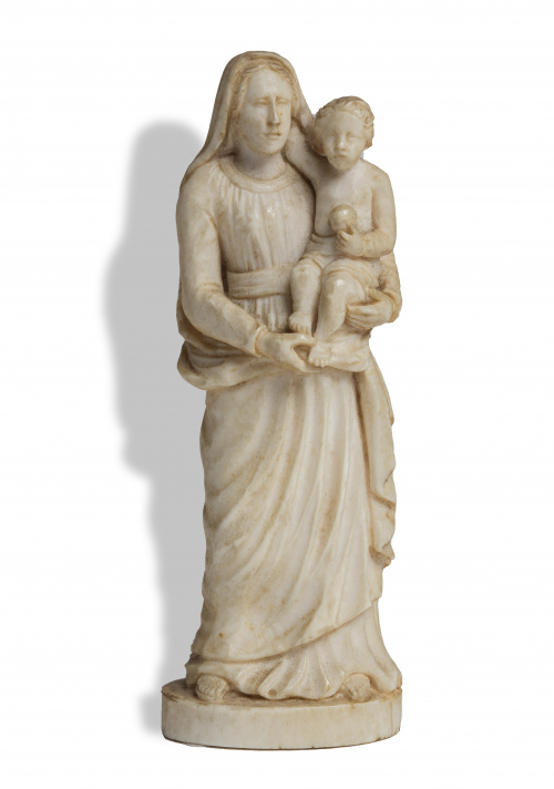 “Virgen con el Niño”Marfil tallado.Trabajo español, S. XV
