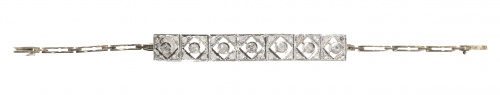 Pulsera de brillantes en siete motivos cuadrados articulado