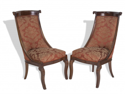 Pareja de butacas de madera de caoba de estilo imperio. Fra