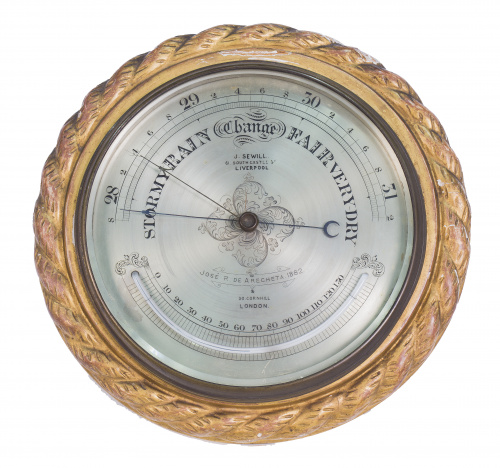 Barómetro con marco de madera tallada y dorada. J. Sewill