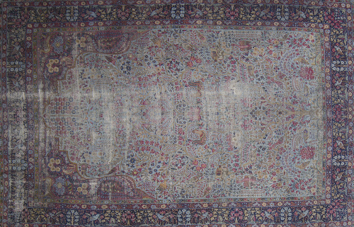 Alfombra persa en lana con decoración de aves y motivos veg
