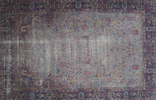 Alfombra persa en lana con decoración de aves y motivos veg