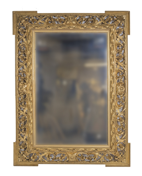 Espejo de madera tallada, estucada y dorada.S. XIX