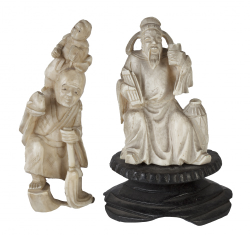 Dos dignatarios tallados.Trabajo chino.