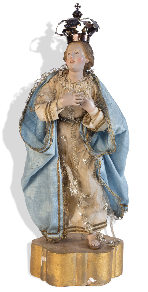 Virgen en terracota policromada con vestimenda en seda.Tra