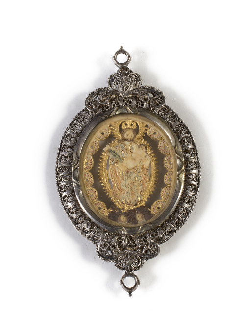 Medalla devocional de marfil policromado, con dos viriles, 