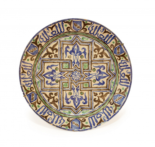 Plato de cerámica esmaltada esmaltado en ocre, verde y azul