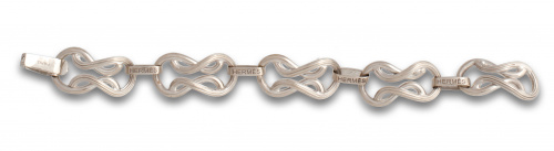Brazalete HERMES con nudos de rizo articulados. En plata.