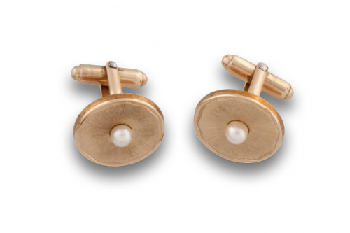 Gemelos KREMENTZ con círculos de metal dorado grabado y sím