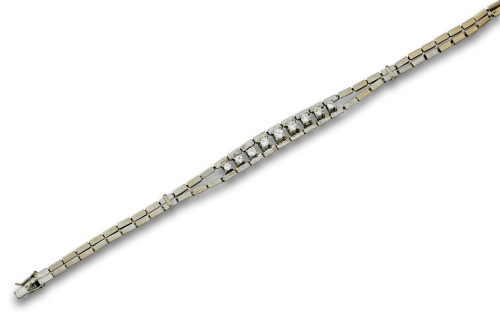 Pulsera con línea de brillantes entre plaquitas de oro blan