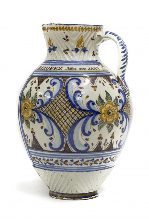 Jarro de cerámica esmaltada en azul, manganeso y ocre, con 