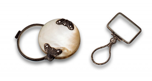 Dos lupas de pps s XX en plata.