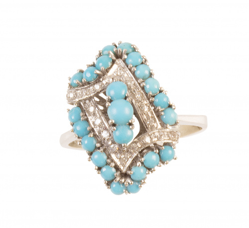 Sortija lanzadera de turquesas y brillantes que componen un