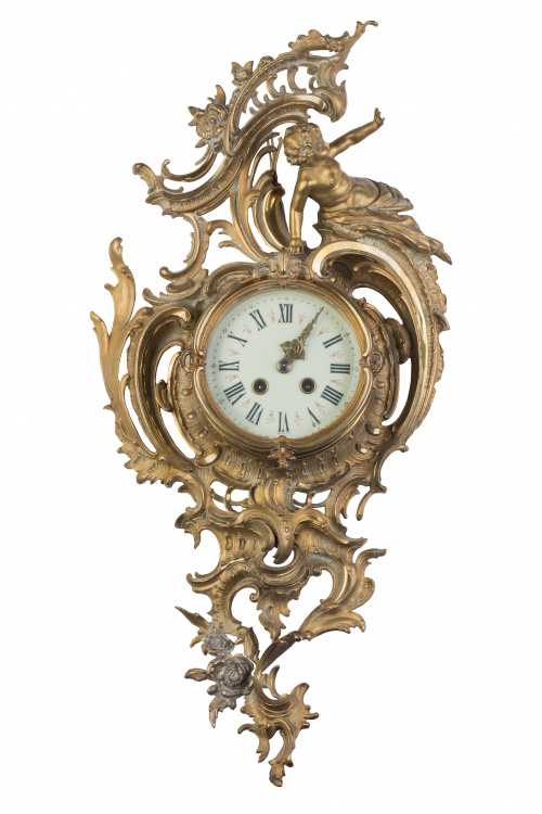 Reloj de bronce estilo Luis XV, de estilo rococó con un niñ
