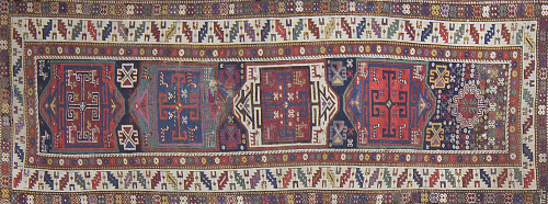 Alfombra persa con decoración geométrica de cartuchos