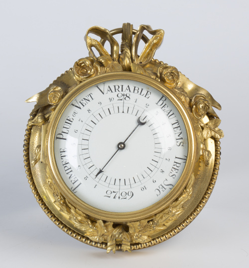 Barómetro en bronce dorado de estilo Luis XVI con esfera es