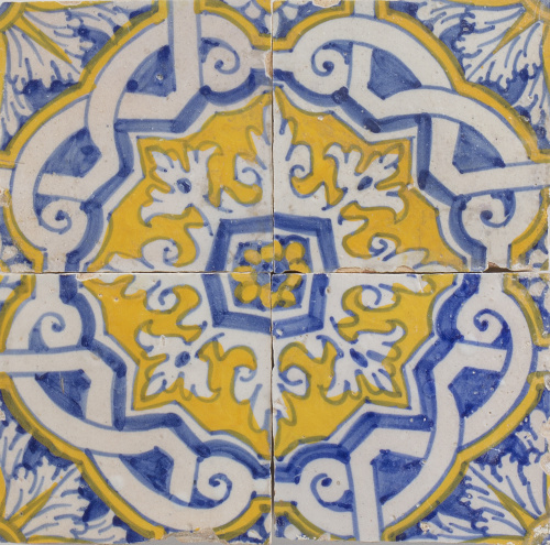 Panel de azulejos esmaltados en azul, y amarillo, con motiv