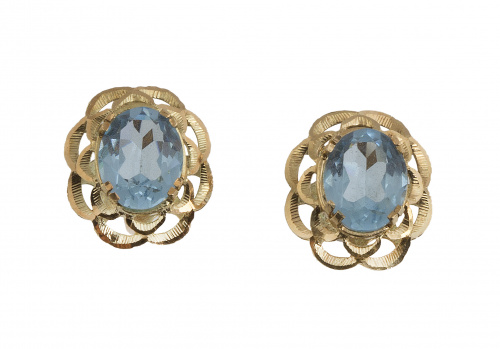 Pendientes con topacio azul de talla oval y marco en forma 