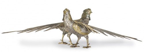 Pareja de faisanes decorativos en metal plateado, S. XX.