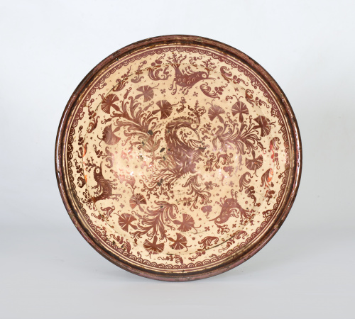 Plato acuencado de cerámica esmaltada en reflejo metálico d