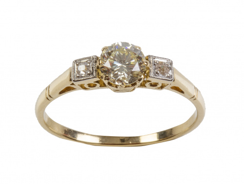 Sortija solitario de brillante flanqueado por dos brillanti