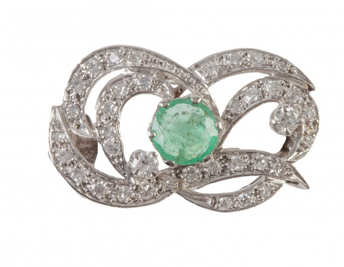 Broche años 50 con esmerlda central de talla redonda rodead