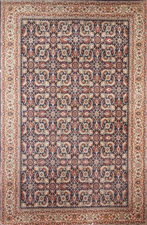 Alfombra persa de campo beige y motivos azules.Persia, h.